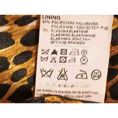 Dolce & Gabbana - Abito tubino in acetato di colore nero lucido - Italianfashionglam